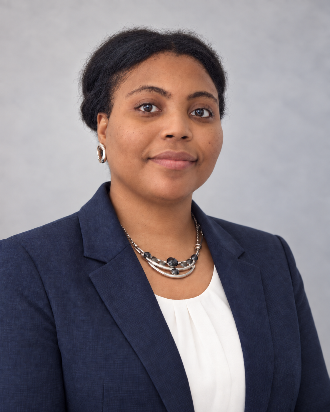 Professional portrait of Dr Otobong Daggash